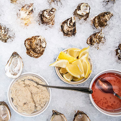 oysters in ice with sauces at 167 Raw