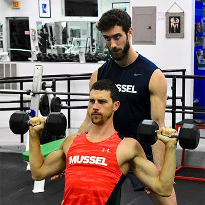 Men lifting weights