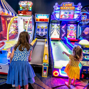 Kids playing arcade games