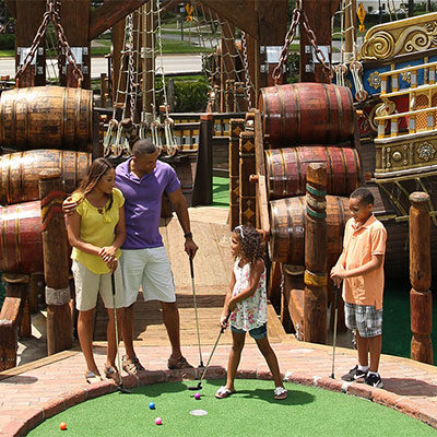 Family mini golfing