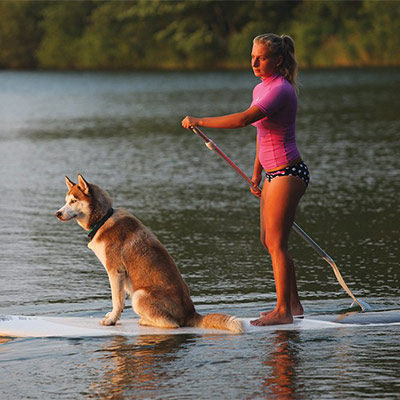 Paddleboarding with dog at Nickerson State Park