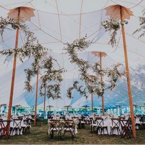 big sky tent decorated with greens