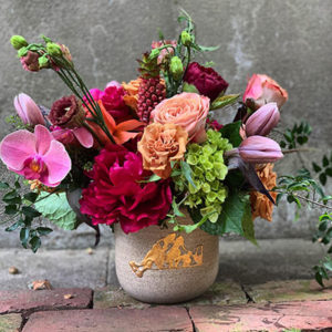 Arrangement from juniper with martha's vineyard pot