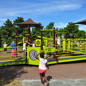Kids playing at the maria mitchell discovery playground at hinsdale park