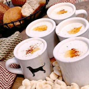 latte in black dog mug