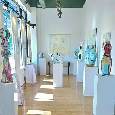 Art gallery with sculptures and paintings